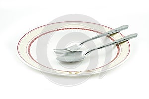 Empty dish spoon and fork