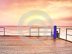 Empty dock, calm sea and sky background