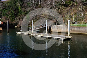 Empty Dock And Cement Landing Area Along River Bank