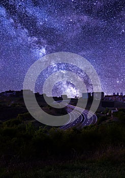 Empty E-75 highway making S curve through Belgrade, Serbia at night with stary sky and milky way.