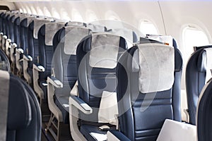 Empty economy class seats in the cabin of the aircraft
