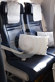 Empty economy class seats in the cabin of the aircraft