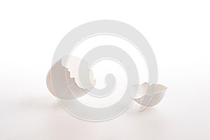 An empty egg shell on white background