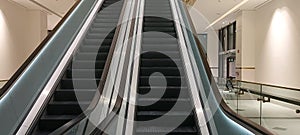 empty elevator stairs with glass railling