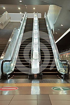 Empty escalator stairs in a train station