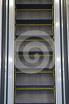 Empty escalator top view background vertical