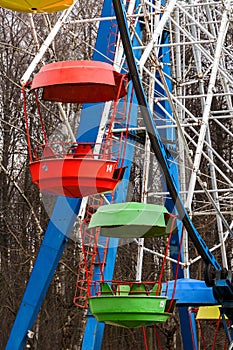 Empty Ferris wheel booths in the Park in early spring. Ferris wheel booths close-up