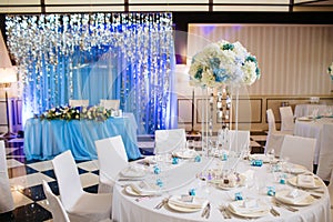 Empty festive tables in a restaurant. Wedding banquet Hall