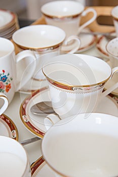 Empty fine bone China teacups and saucers