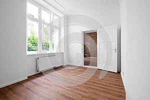 empty flat, unfurnished room after renovation with big window