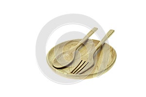 Empty flat wooden dish, fork and spoon isolated on white background
