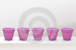 Empty flower pots of different colour and different prospective, isolated on white background, copy space.
