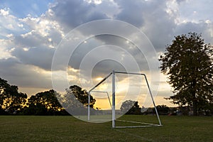 Empty Football Goals at Sunset