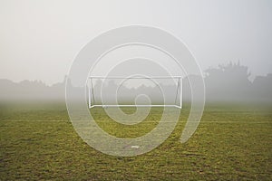 Empty football pitch and frosty winter morning