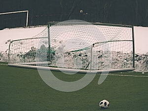 Empty football playground in winter