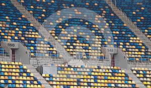 Empty football sport stadium seats during coronavirus pandemic without people