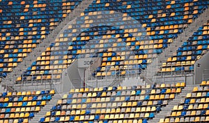 Empty football sport stadium seats during coronavirus pandemic without people