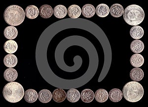 Empty frame of Dutch guilders and 10 guilder coins with black background photo