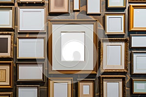 empty frame among a gallery wall of varioussized frames, no artwork