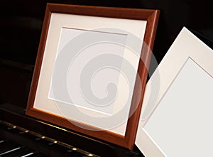An empty frame on a pianoforte