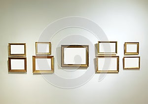Empty frames on a gallery wall