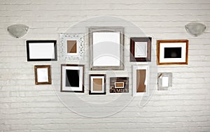 Empty Frames and Lamps on White Bagged Wall