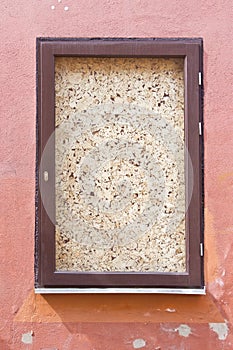 Empty frames on the old wall