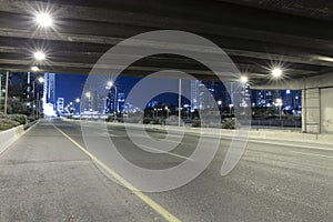 Empty Freeway At Night And Tel Aviv Skyline in Background