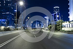 Empty Freeway At Night And Tel Aviv Skyline in Background