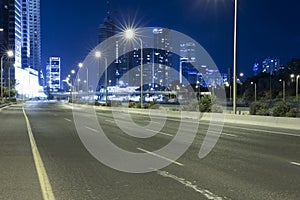 Empty Freeway At Night And Tel Aviv Skyline in Background