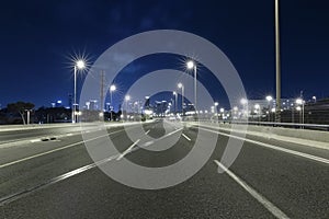 Empty Freeway At Night And Tel Aviv Skyline in Background