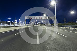 Empty Freeway At Night And Tel Aviv Skyline in Background