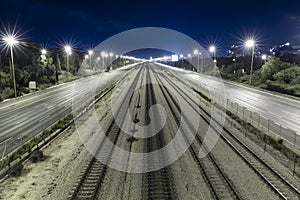Empty Freeway And Railway And Night