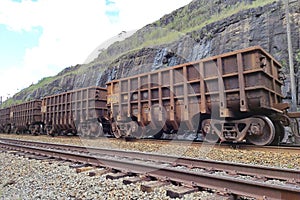 Empty freight train wagons standing on the railroad