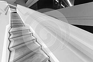 Empty futuristic stairway in modern building. Architectural abstract background