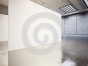 Empty gallery interior with white canvas and