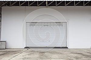 Empty garage with Shutter door or roller door and concrete floor