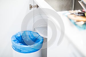 Empty garbage in the kitchen , blue trash