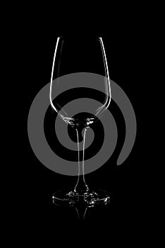 Empty glass on black background