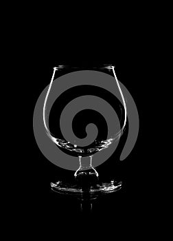 Empty glass on a black background