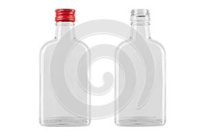Empty glass bottle with a red cap from a medicine or an alcoholic drink of vodka, whiskey isolated on a white background. File