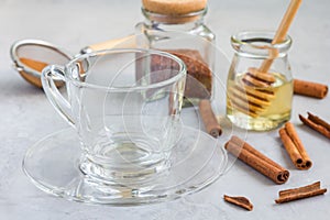 Empty glass cup and ingredients for healthy rooibos red tea