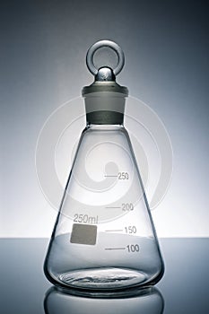 Empty glass flask placed in a laboratory table