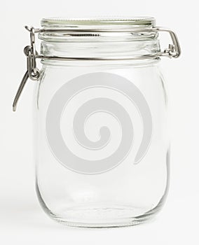 Empty glass food preserving jar