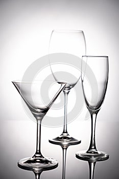 Empty glass goblets set.On a white background abstract