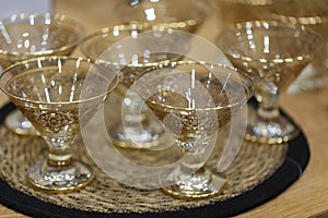 Empty glass ice cream dish. Ice cream glasses are on the table. The glasses are empty.