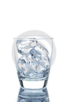 Empty glass with ice cubes