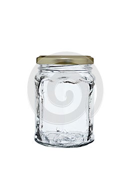 Empty glass jar with an iron lid isolated on a white background