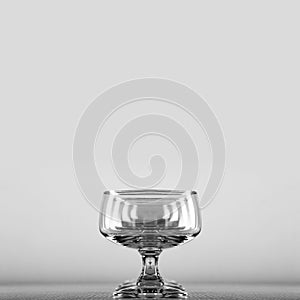 Empty glass, red glass with wine bottle