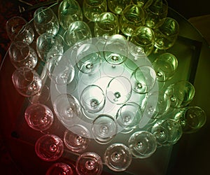Top view of Glass wine cups arranged in a row to form a design